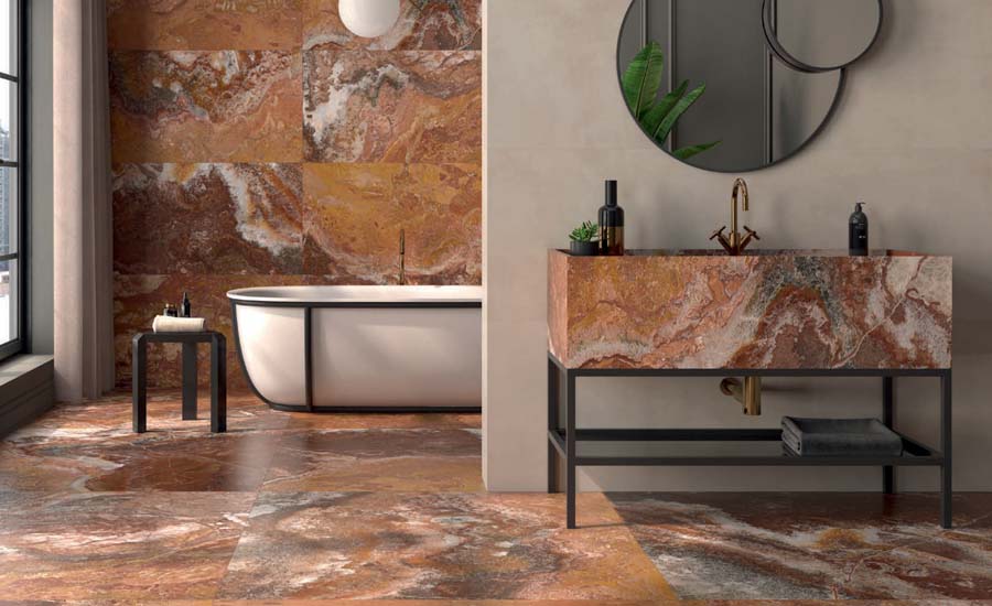 A bathroom with beige and brown tiles