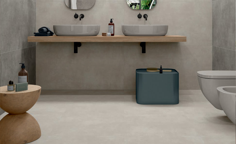 Stone-effect ceramic tiles in a bathroom with two sinks