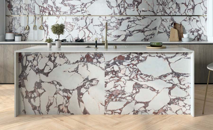 A kitchen with a wood-effect tile floor