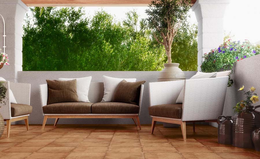 A seating corner with sofas and beautiful flooring of ceramic tiles with a terracotta feel