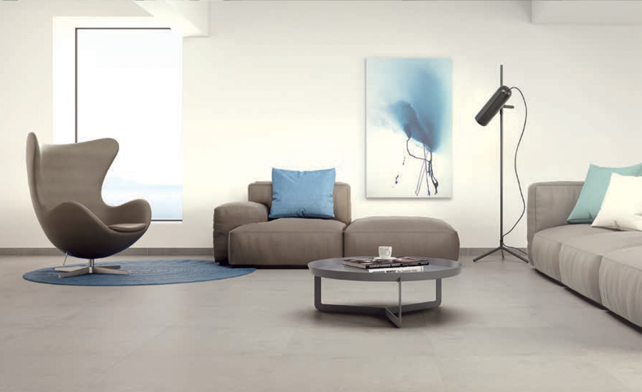 Interlocking tiles with a seamless design shown in an office space with neutral tones
